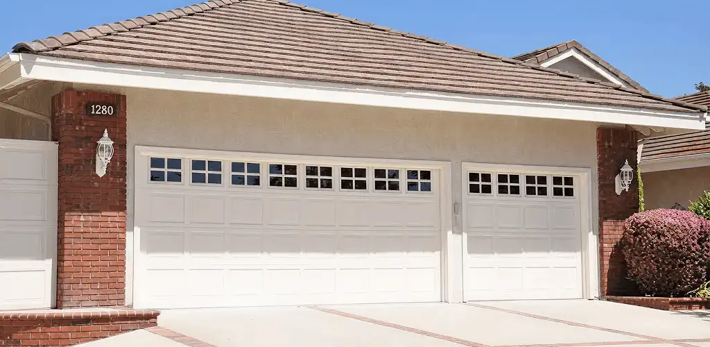 Residential garage door repair service for a double garage door in Jacksonville, FL