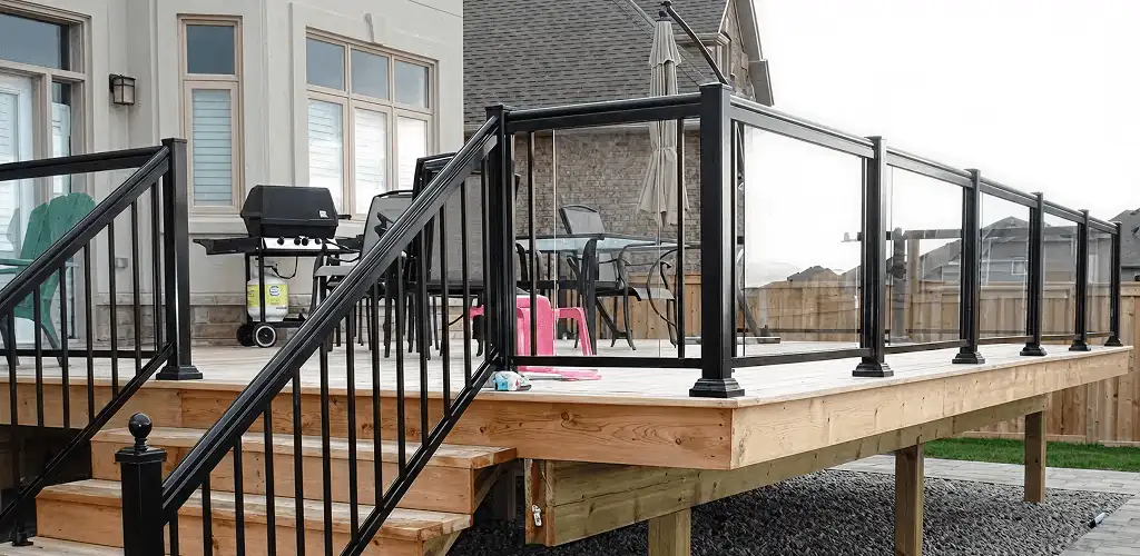 Handrail installation on a deck staircase for safety and code compliance in Jacksonville, FL