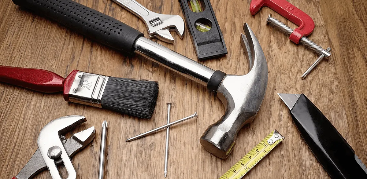 Handyman tools laid out for home repair and maintenance work in Jacksonville, FL