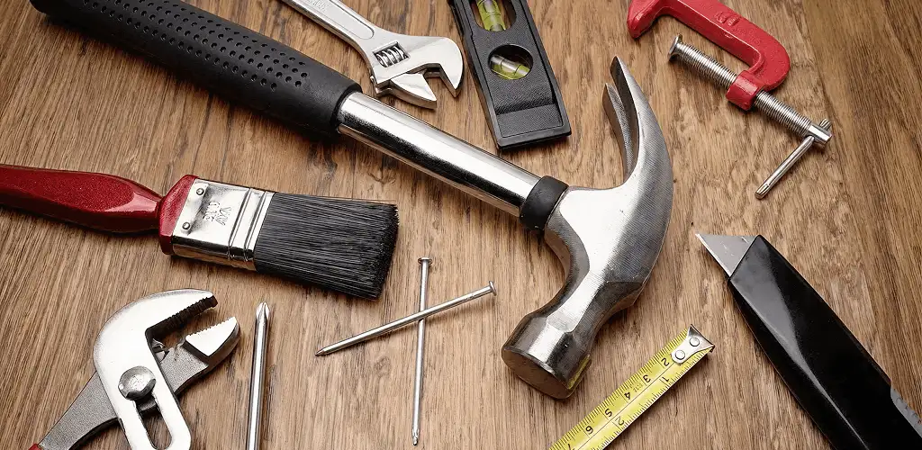 Handyman tools laid out for home repair and maintenance work in Jacksonville, FL
