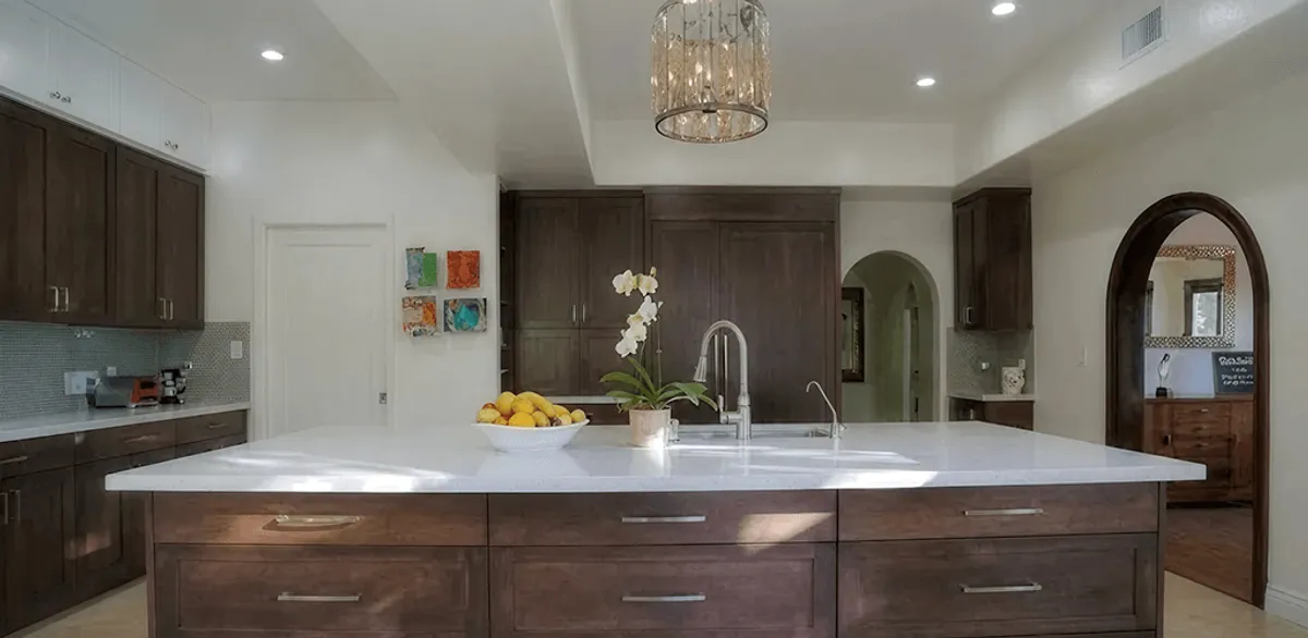 Cabinet refacing project with updated kitchen cabinets and island in Jacksonville, FL